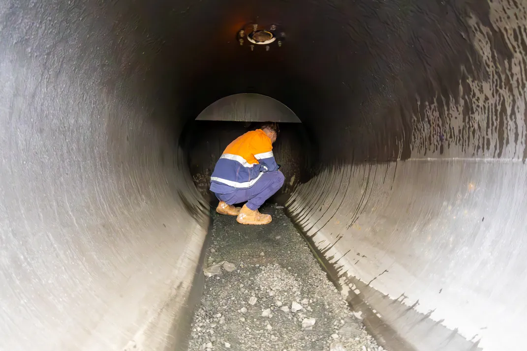 APEC Inspection technician carrying out an internal inspection inside a large vessel