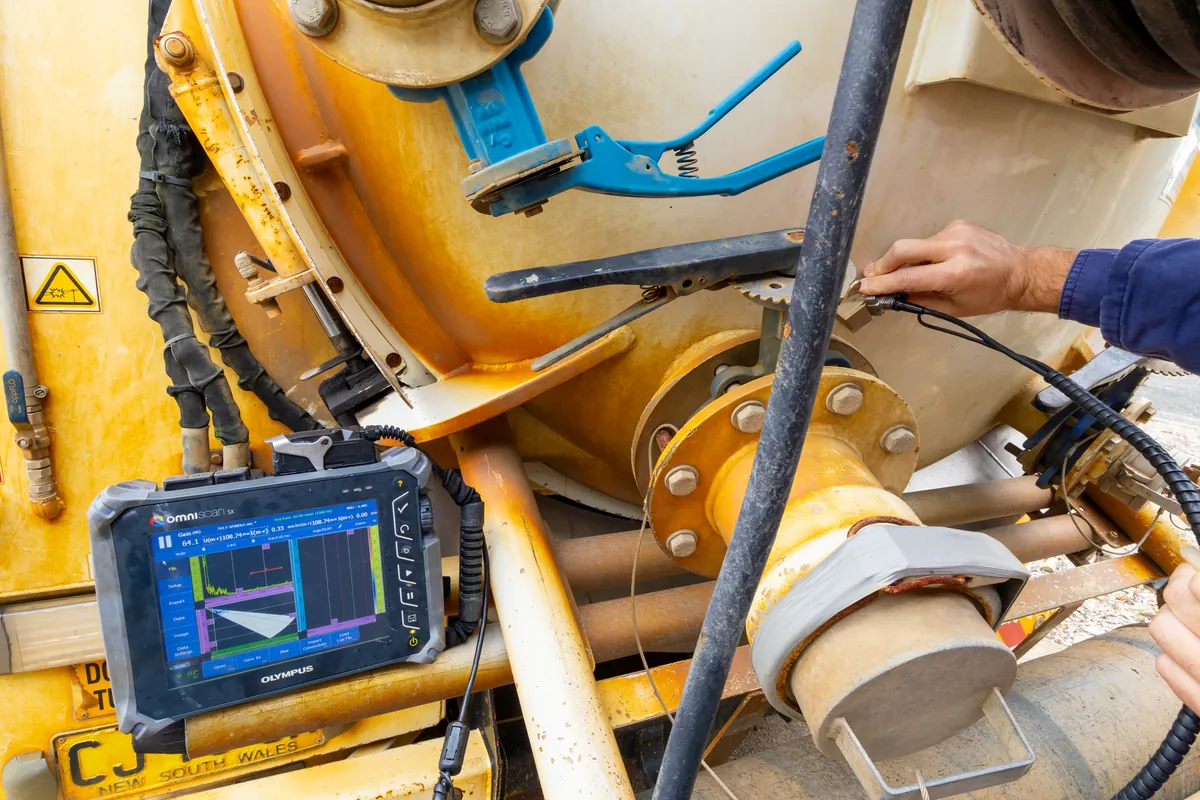 APEC technician carrying out phased array ultrasonic testing on plant equipment