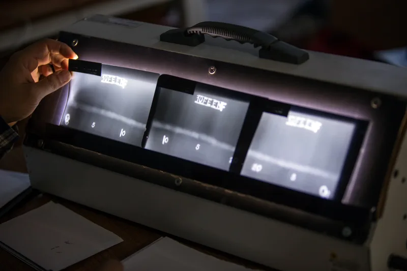 Independent radiographic film interpretation and quality review